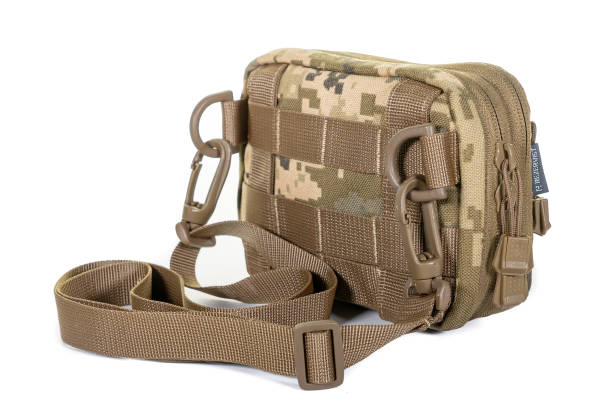 Green Canvas Backpack Isolated on White. Front View of Modern Waterproof Camping Traveler Back Pack Bag with Shoulder Straps Haul Loop. Tactical Hiking Backpack For Travel Travel for Men