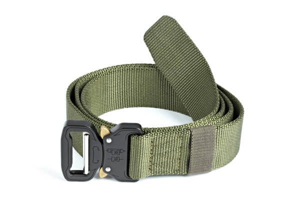 Green mens nylon fastening belt isolated on white background. Men's fashion outdoor military tactical belt.